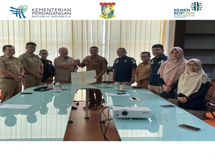 Kadis Perdagkop & UMK Kampar melakukan Penandatanganan Perjanjian Kerjasama di Bidang Kemetrologian